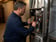 Technician diagnosing a residential furnace
